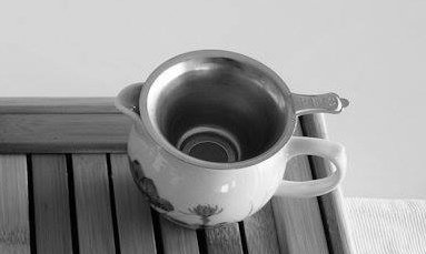 Chinese tea strainer and pitcher