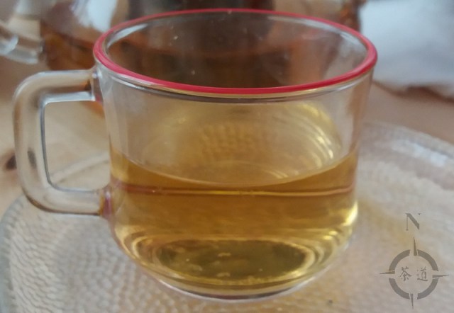 a small cup of green gunpowder tea
