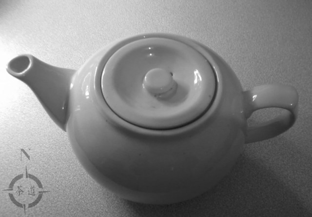 small white tea pot