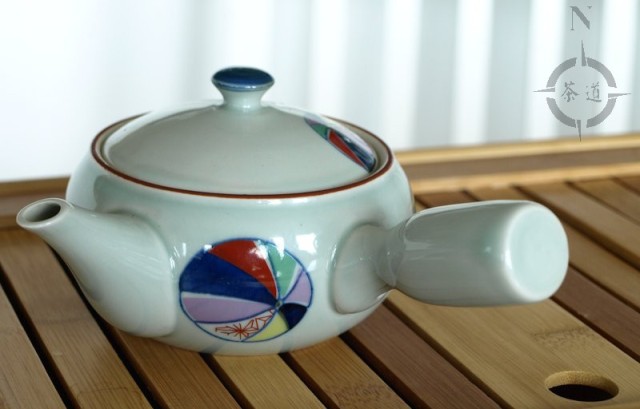 side handled teapot