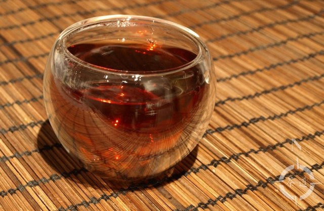 a cup of 2012 Xiaguan 7663 Cooked Beeng Cha